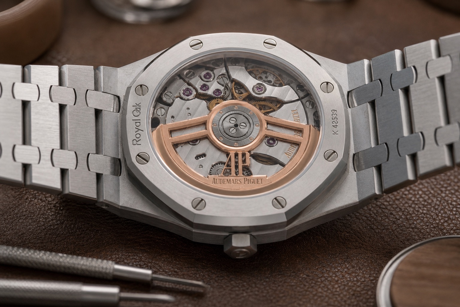 The back of a steel Royal Oak 15500ST, showing calibre 4302 and its skeletonised gold rotor through the sapphire caseback