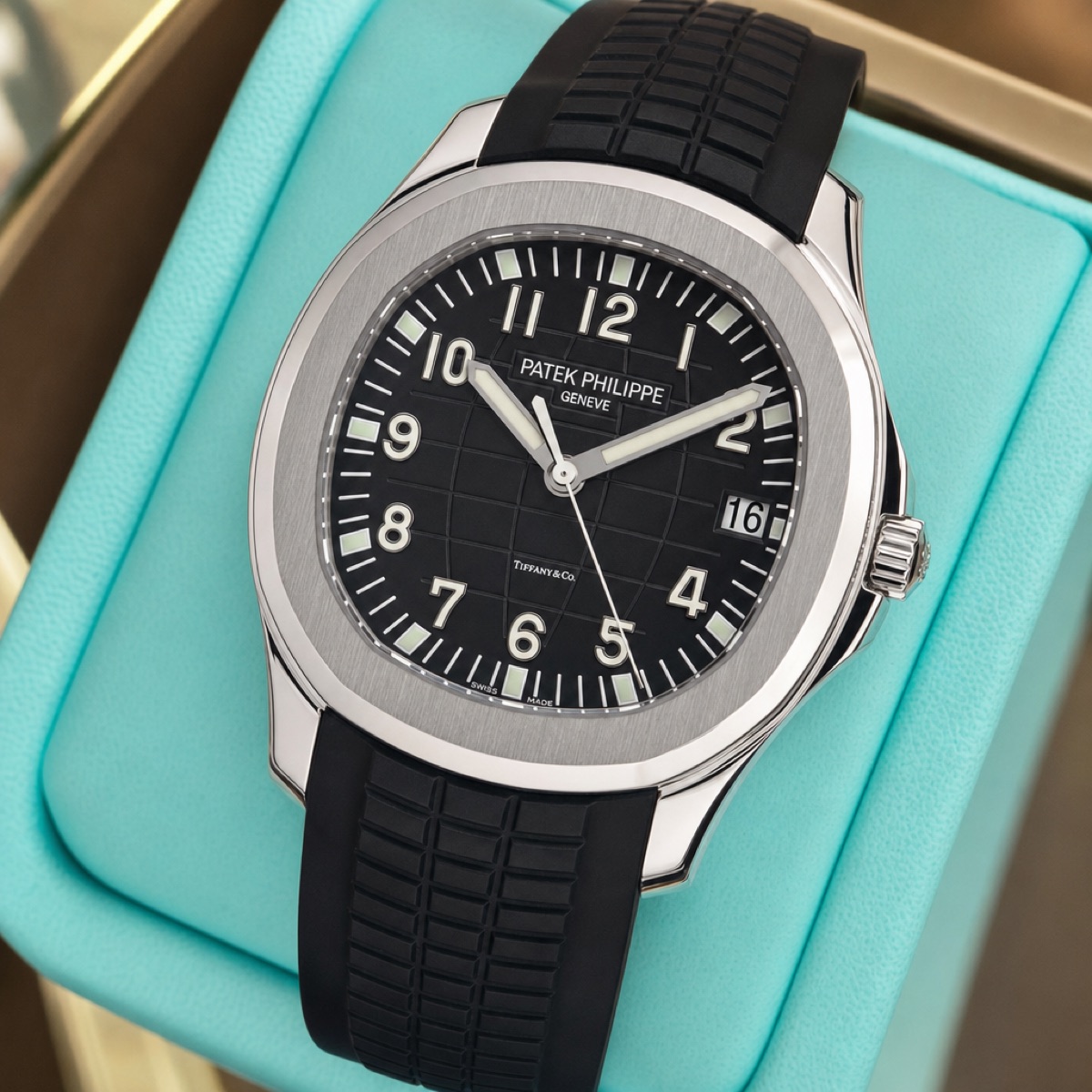 Patek Philippe Aquanaut 5167A with Tiffany & Co. signature at six o'clock on the black embossed dial