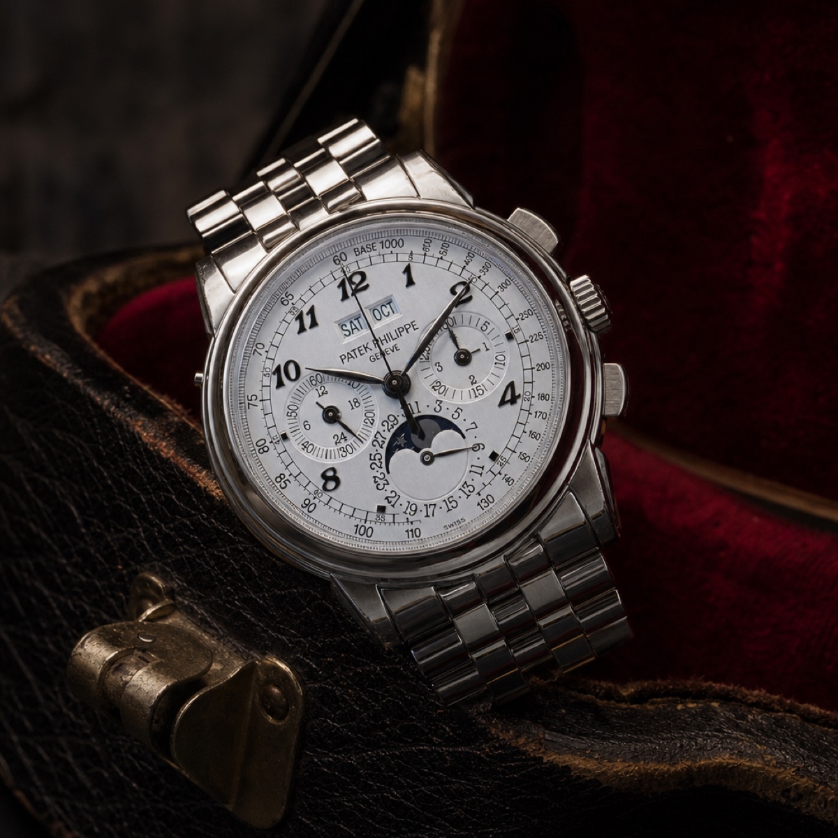 Patek Philippe 5970 in white gold with Breguet numerals for the hours on a polished gold bracelet