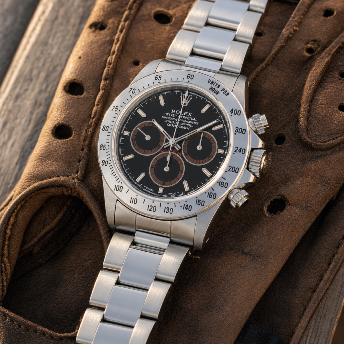 Rolex Daytona 16520 black dial whose subdial rings have aged to a warm brown, the Patrizzi dial